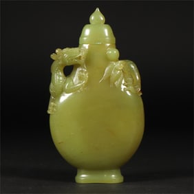 A Hetian jade topaz dragon pattern jade vase from the Qing Dynasty
