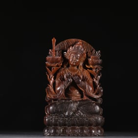 A beautiful precious horned carved statue of Manjushri Bodhisattva