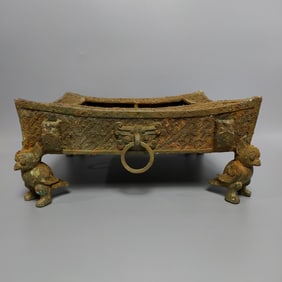A bronze four-bird square pot from the Warring States period