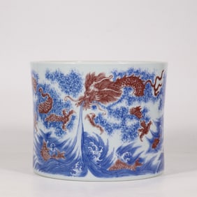 A blue and white glazed red sea fish and dragon pattern pen holder made in the Kangxi period of the