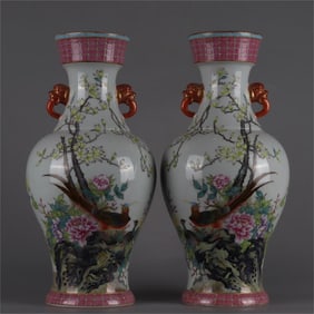 A pair of enamel peony flower and bird amphorae made in the Qianlong period of the Qing Dynasty