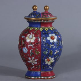 A Qing Dynasty Qianlong enamel color-rolled floral pattern one-piece bottle
