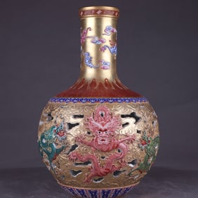 A gold background pastel thread hollow cloud dragon pattern celestial ball bottle made in the
