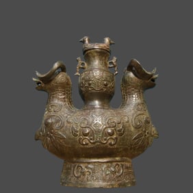 A beautiful bronze double sheep inscription