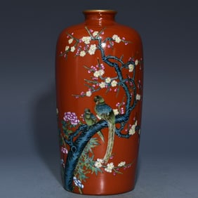 A plum vase with alum red pastel flowers and birds made in the Qianlong period of the Qing Dynasty