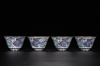 A blue and white Doucai gold-painted phoenix pattern cup made in the Qing Dynasty and the Qing