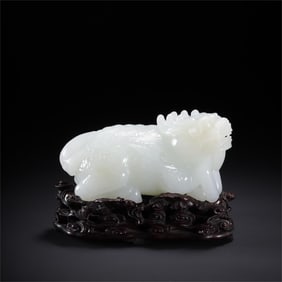 A Qing Dynasty Hetian jade unicorn ornament