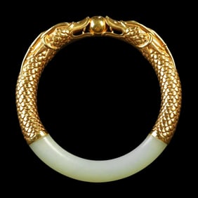 A silver gilt inlaid double dragon pearl old jade bracelet of the Qing Dynasty