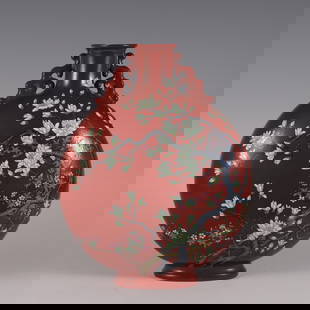 A coral red enamel colored magnolia pattern flat bottle made in the Qianlong period of the Qing: Qing Dynasty Qianlong year coral red enamel colored magnolia pattern flat bottle Size:H:31.5cm Belly diameter:25cm Mouth D:6cm (The Dimensions Of All Batches Are Manually Measured.If You Need More Det