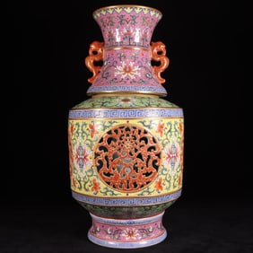 A Qing Dynasty Qianlong year Twelve Happiness pastel hollow heart vase