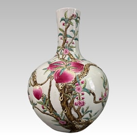 A pastel nine-peach Tianqiu vase made in the Qianlong period of the Qing Dynasty