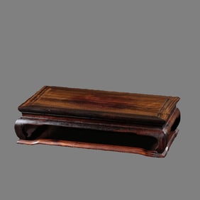 A beautiful small-leaved rosewood with mud support