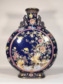A Qing Dynasty enamel colorful blue glaze flower and bird gold-painted moon vase