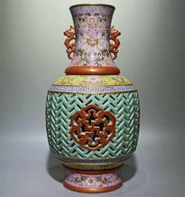 A Qing Dynasty Qianlong model of enamel colored phoenix tail grass bean celadon glaze hollow