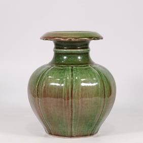 A kiln-glazed melon edge flower mouth bottle made in the Xuande year of the Ming Dynasty