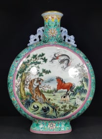 A Qing Dynasty Qianlong era enamel green ground intertwined lotus flower window painting of the