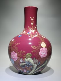 A Qing Dynasty Qianlong era enamel carmine red flower bird peace poetry poetry gilded heavenly ball