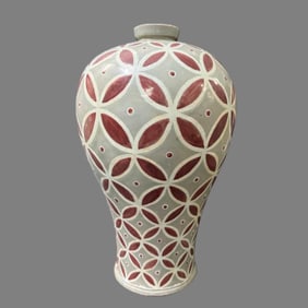 A Korean celadon celadon glazed red plum bottle in the Song Dynasty