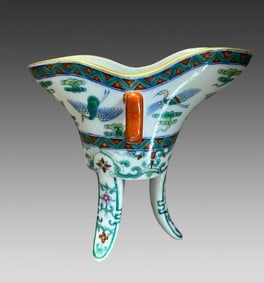 A beautiful cup with a colorful cloud crane pattern