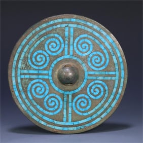 A turquoise bronze mirror from the Han Dynasty