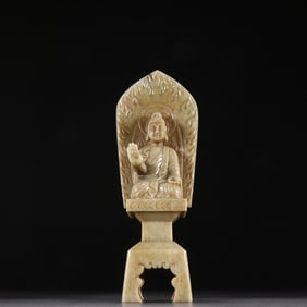 A Hetian jade Shakyamuni bench Buddha from the Northern Wei Dynasty