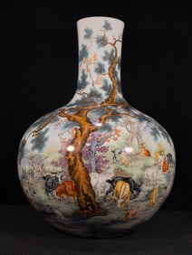 A Qing Dynasty enamel color hundred sheep Tianqiu vase
