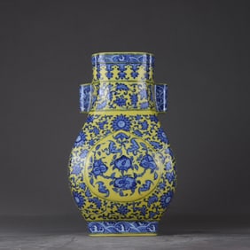 A Qing Dynasty Qianlong model of yellow blue and white intertwined branches with Fushou amphora