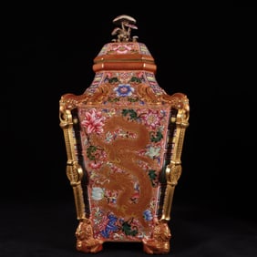 A Qing Dynasty Qianlong year anchovy pastel alum red gold-painted entwined lotus flower dragon and