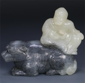 A Qing Dynasty Hetian jade blue and white seed material Fuhu Arhat ornament