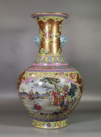 A Qing Dynasty Qianlong era enamel yellow ground gold-painted Kowloon window character story bottle