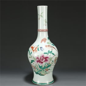 A pastel flower and bird long-necked vase from the Qing Dynasty