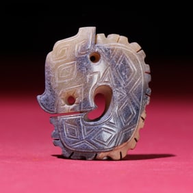 A piece of mercury in the Han Dynasty is slightly calcified and covered with gray skin and dragon