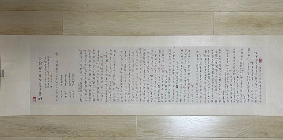 A vertical scroll of Hongyi's calligraphy on paper