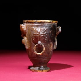 A dragon living ring copper gilt jade cup of the Han Dynasty