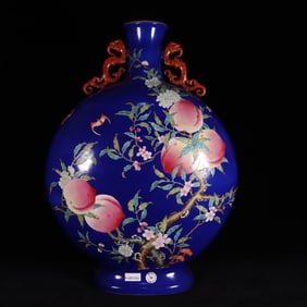 A blue-glazed pastel nine-birthday peach double dragon ear moon vase made in the Qianlong era