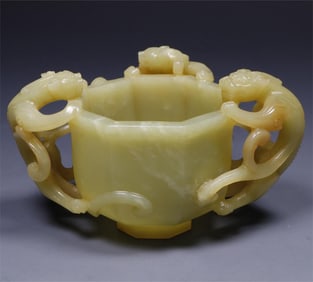 A Qing Dynasty Hetian topaz dragon cup