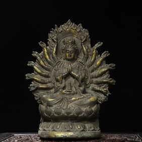 A bronze statue of Guanyin with a thousand hands