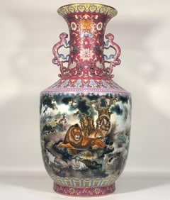 A Qing Dynasty Qianlong era enamel carmine red flower painting dragon ear bottle
