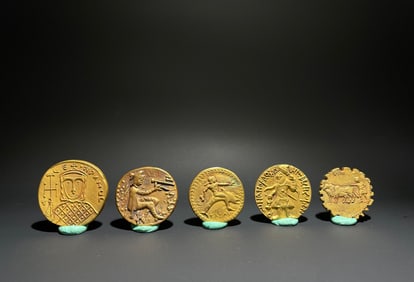 A set of fine Kushan dynasty gold coins