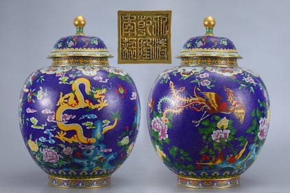 A pair of copper cloisonné enamel dragon and phoenix jars made in the Qianlong period of the Qing