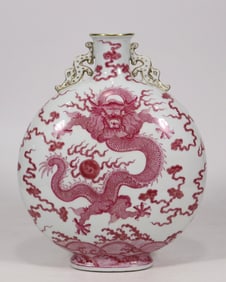 A carmine red double dragon pattern moon vase made in the Yongzheng year of the Qing Dynasty