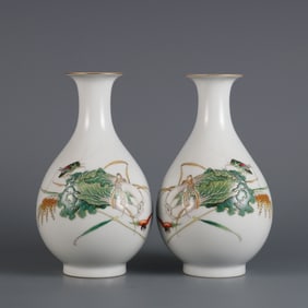 A pair of enamel color hundred wealth pattern jade pot spring vases made in the Yongzheng year of