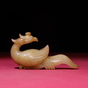 A small ornament of the Warring States period of Hetian white jade full of phoenix birds