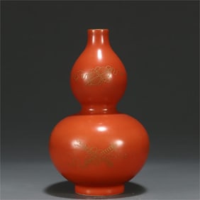 A beautiful red glazed gilded gourd bottle