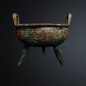 A bronze three-legged tripod of the Shang and Zhou dynasties