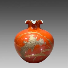 A coral red gold-painted pomegranate statue made in the Yongzheng era