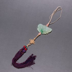 A jade butterfly-shaped pendant from the Qing Dynasty