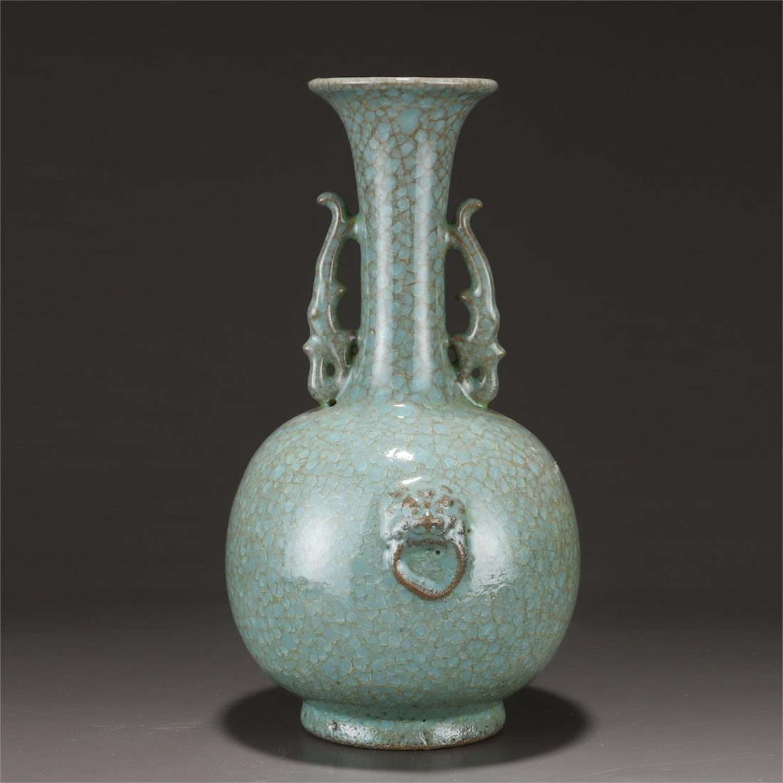 A sky-blue glazed ice flake pattern amphora head vase of the Ru kiln in the Song Dynasty: The azure glaze ice flake pattern amphora head bottle of the Ru kiln in the Song Dynasty SIZE: H:26.7cm Belly D:16cm (The Dimensions Of All Batches Are Manually Measured.If You Need More Detailed Info
