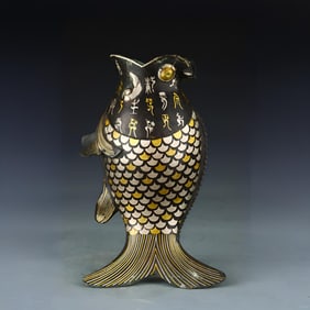 A Han bronze wrong silver fish-shaped ornament