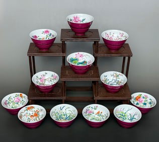A set of carmine red glazed enamel color twelve flower god cups made in the Yongzheng era